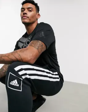 adidas skinny 3 stripe joggers in black